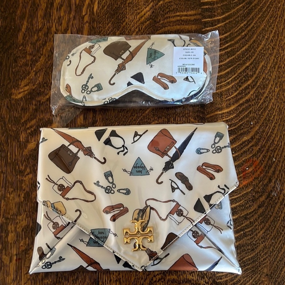 Tory Burch White and Brown Patterned Clutch with Eye Mask